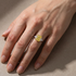 Yellow Three-Stone Engagement Ring Worn on Hand