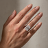 Large emerald cut engagement ring worn on hand