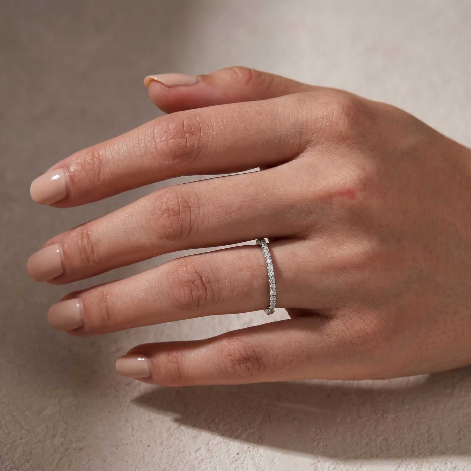 White Gold Thin Wedding Band Styled on Finger