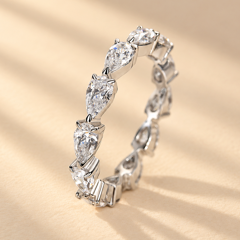 Louily Eternity Pear Cut Wedding Band In Sterling Silver