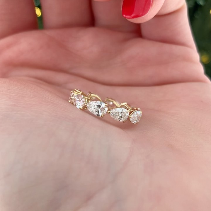 Louily Eternity Pear Cut Wedding Band In Sterling Silver