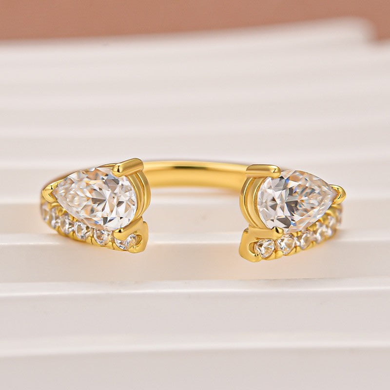 Moissanite 1.0Ct Pear Cut Yellow Gold Open Wedding Band In Sterling Silver