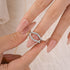 White Gold Vintage Wedding Ring Enhancer Held in Hand