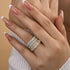Woman wearing a cushion cut four-piece bridal ring set