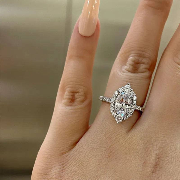 Louily Unique Design Halo Oval Cut Simulated Diamond Engagement Ring In Sterling Silver