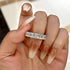 Sterling silver cushion cut wedding band close-up