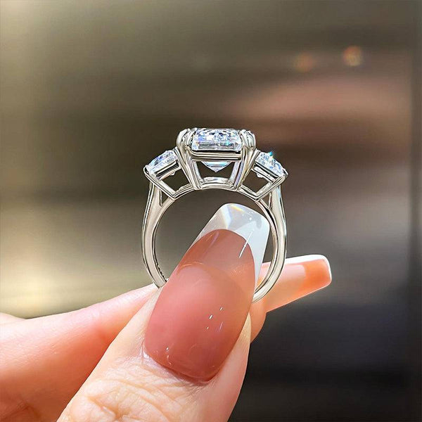 Louily Luxurious Emerald Cut Three Stone Engagement Ring In Sterling Silver