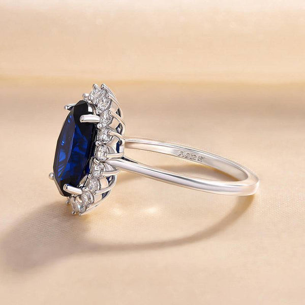 Louily Luxurious Halo Oval Cut Blue Sapphire Engagement Ring In Sterling Silver