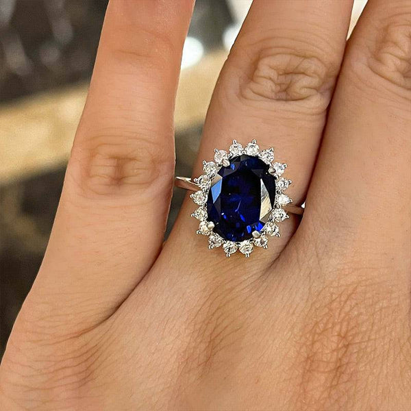 Louily Luxurious Halo Oval Cut Blue Sapphire Engagement Ring In Sterling Silver
