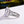 Load image into Gallery viewer, Louily Luxurious Split Shank Emerald Cut Engagement Ring In Sterling Silver
