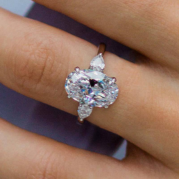 Louily Outstanding Oval Cut Three Stone Engagement Ring