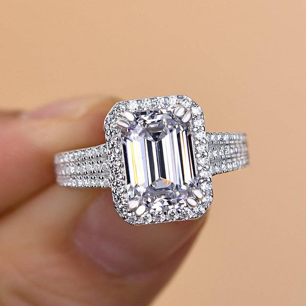 Louily Sparkle Halo Three Shank Emerald Cut Engagement Ring In Sterling Silver