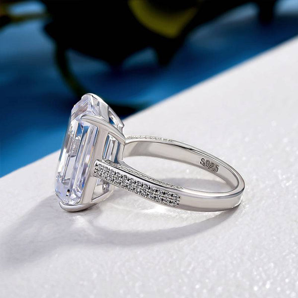 Luxurious Elongated Emerald Cut Engagement Ring In Sterling Silver
