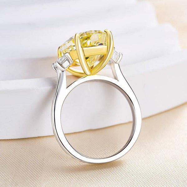 Noble Oval Cut Three Stone Yellow Sapphire Engagement Ring