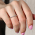 Thin Half Eternity Wedding Band Worn on Finger