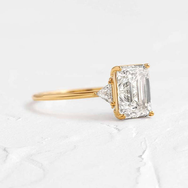 Louily Dainty Three Stone Yellow Gold Emerald Cut Engagement Ring